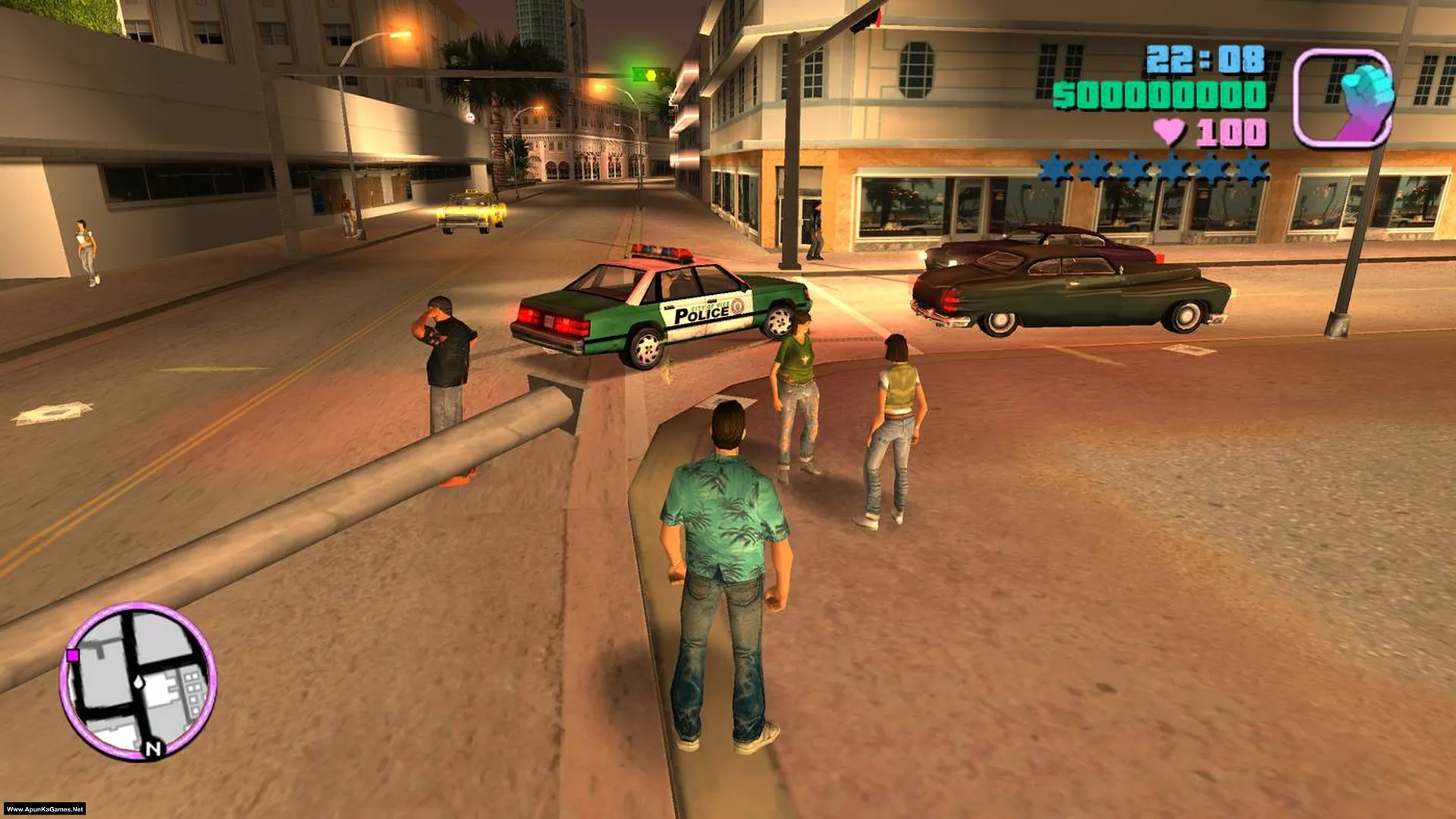Vice City street gameplay with police car and pedestrians
