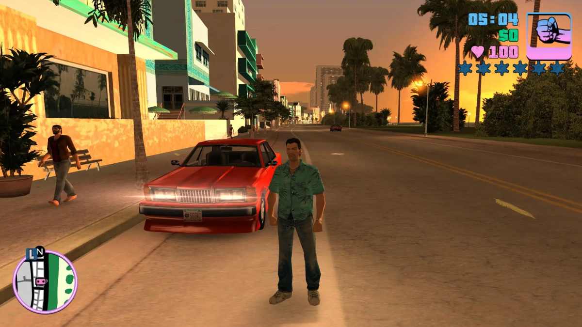 Vice City sunset gameplay with Tommy beside a red car